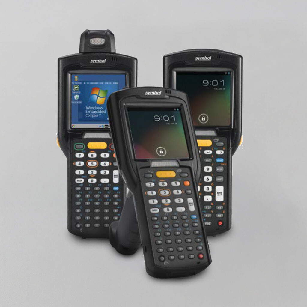 Three black handheld barcode scanners with screens and keypads stand upright on a light gray background; one shows Windows Embedded, two display 9:01.