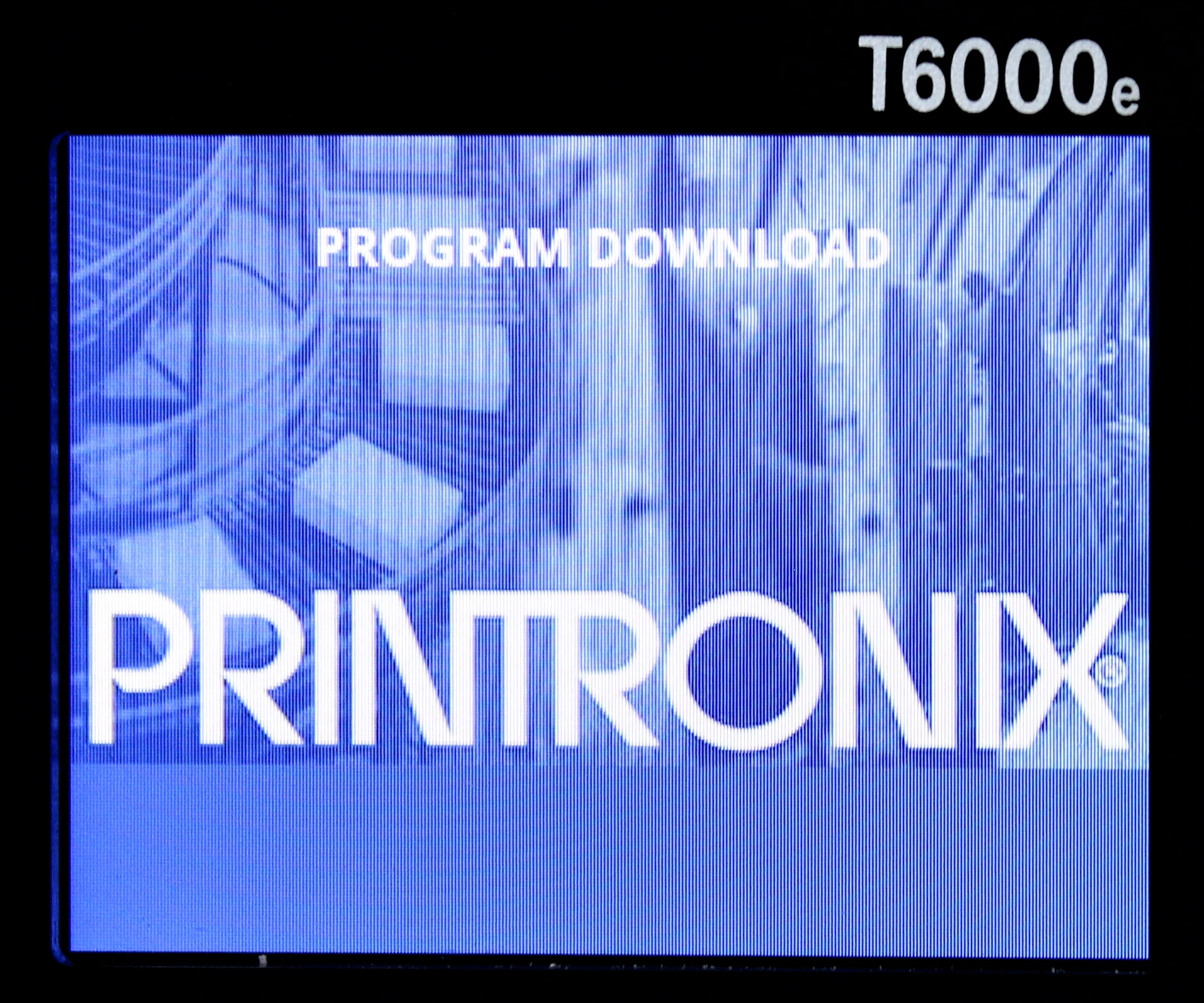 Printer display shows PROGRAM DOWNLOAD and PRINTRONIX in large text, T6000e in the corner, with a blue abstract background.