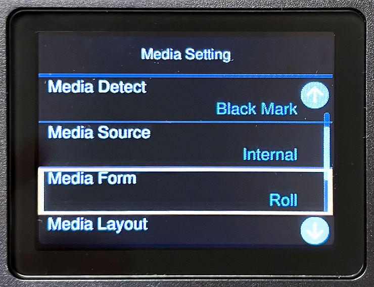 Printer screen displaying media settings: Media Detect Black Mark, Source Internal, Form Roll, with blue arrows for navigation.