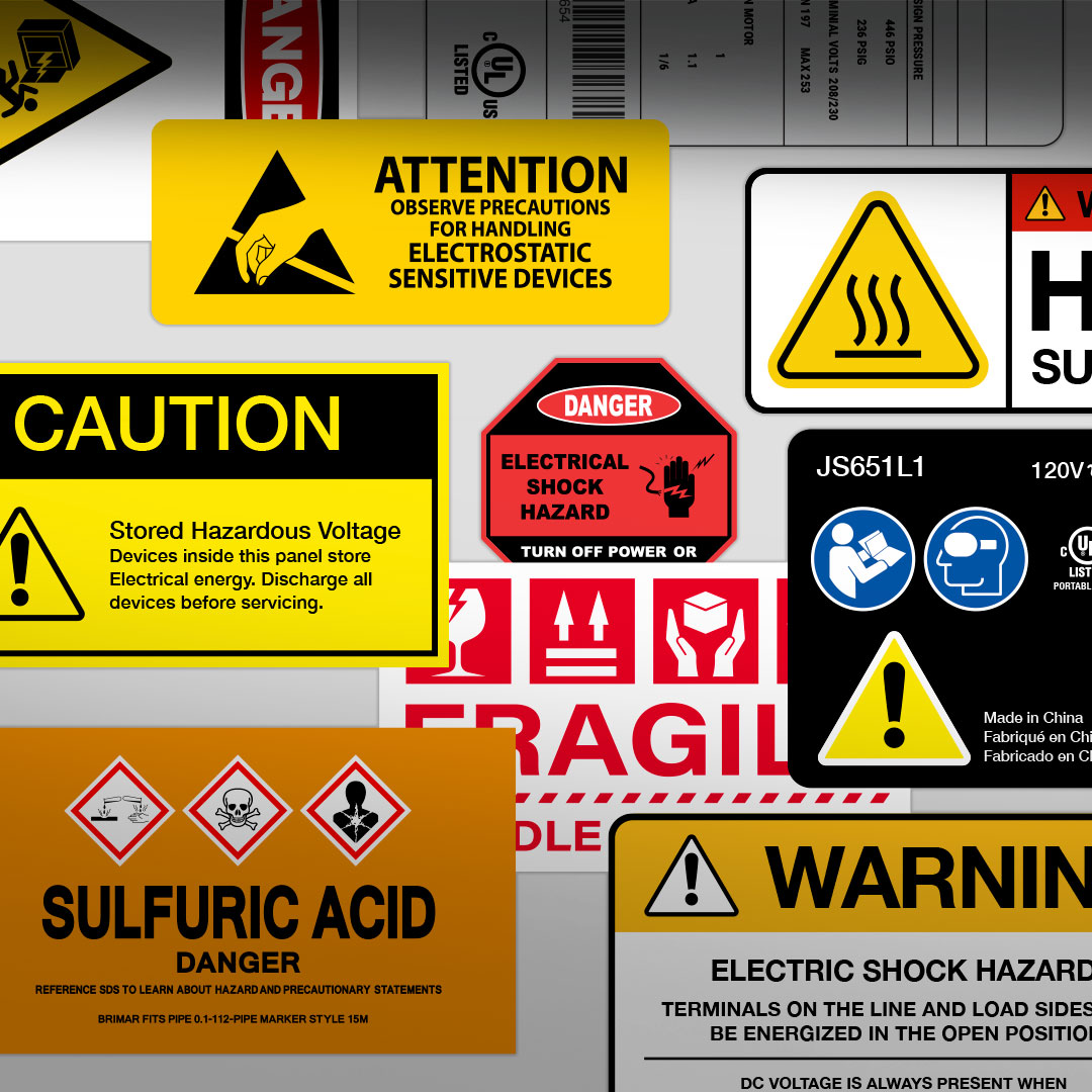 Collage of bold, colorful warning labels for electrical shock, voltage, sulfuric acid, electrostatic risk, and safety instructions.